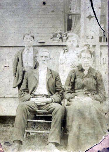 William Byrd Wells & his wife Lucertia Matelia Creese Henley/Hendley Matilda Isabelle Wallace Anderson L to R: sitting, William Byrd Wells; his wife Lucretia Matelia Creese Henley/Hendley.