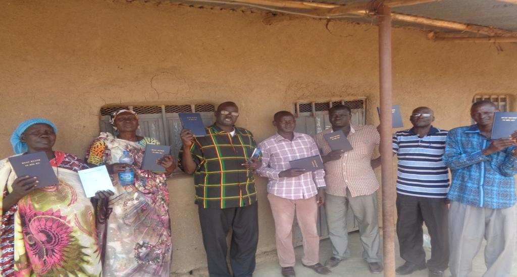LCSS offers Nuer Bible to TLS lecturers and Leaders Donation of