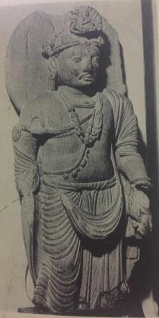 He also appears in preaching pose. As this gesture require both of his hands, he cannot hold the water pot which very often appears on the seat.