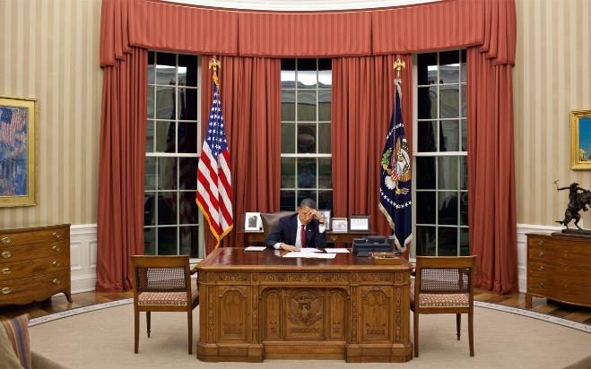 Our president sits behind a desk like the head of any business. He is supposed to be one of us.
