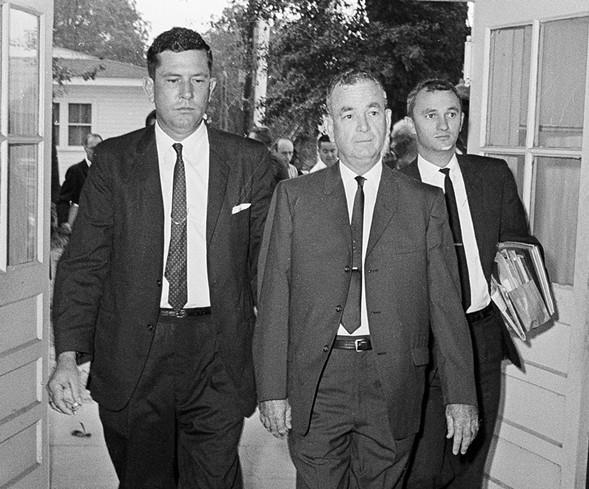Tom Coleman (center) arriving for trial at