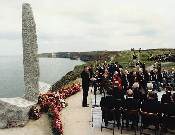 Behind me is a memorial that symbolizes the Ranger daggers that were thrust into the top of these cliffs. And before me are the men who put them there. These are the boys of Pointe du Hoc.