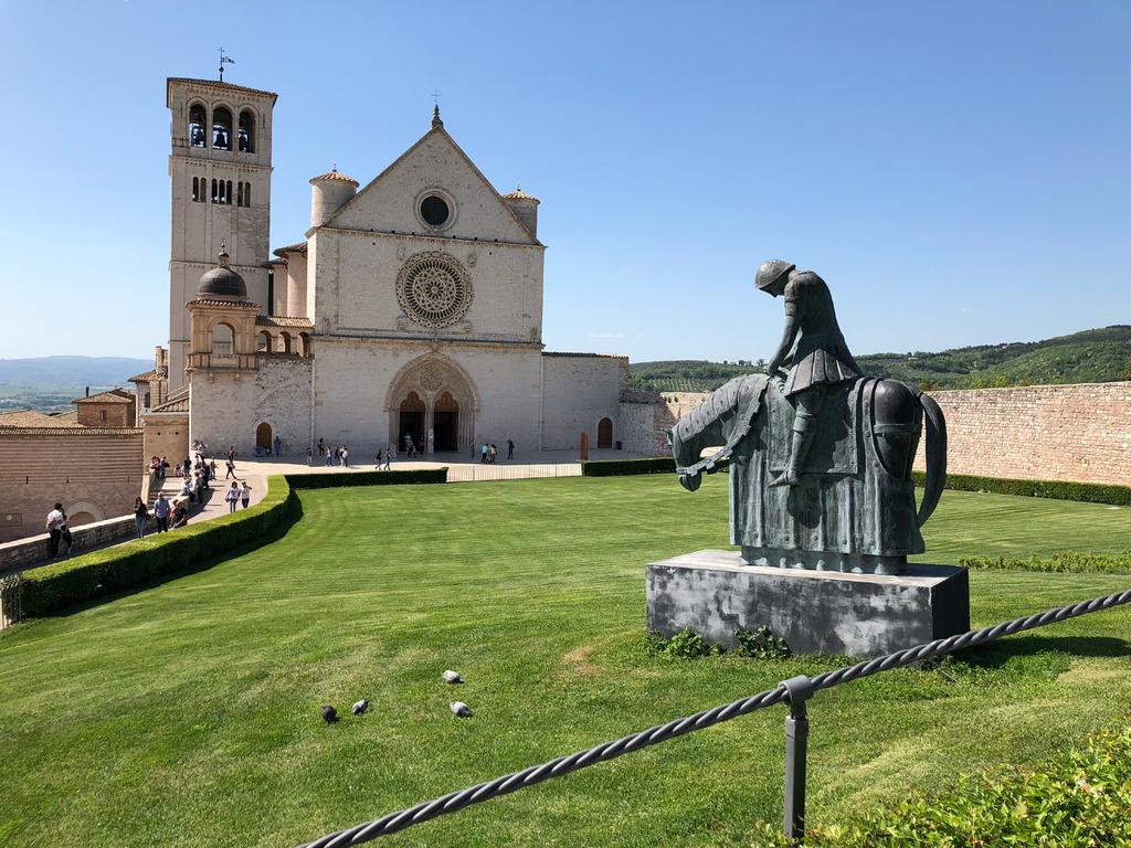 Statue of Francis in front of the Papal Basilica of St. Francis of Assisi. Photo from the Rosicrucian Archives. Rosicrucian Digest No.