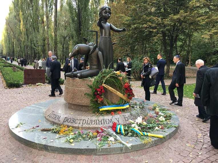 Speaking to possible future atrocities, European Council President Tusk said when confronted with evil and violence, humankind cannot be divided only into DURING THE CEREMONY AT BABI YAR