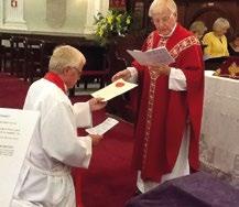 Archdeacon Geoff Johnston hands Area Dean Robert Bates his licence in Porto WELCOME TO Canon John Blair was welcomed as Chaplain of Holy Trinity on the Portuguese Atlantic island of Madeira in late