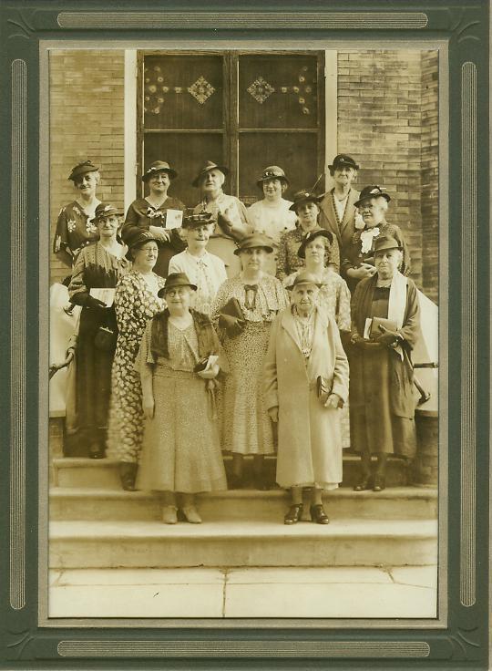 41 - Undated photo of women's Sunday school class in front of church door.