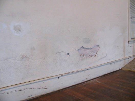 Plaster walls have deteriorated, wood ceilings and trim have rotted and mechanical and electrical systems have