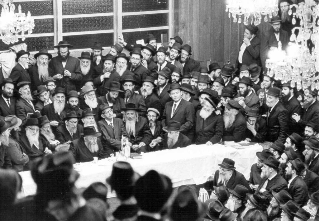 Simchas Torah farbrengen 5728/1967. Photographed by a non-jew from The New York Times privately and pouring out your heart to him.