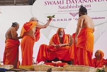 Swami Sudhananda of Rishikesh sprinked mantra sanctified tirtha and holy tirtha from many rivers