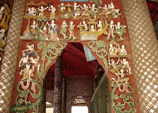 Painted wood carvings of the same building