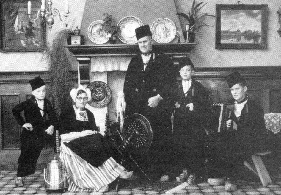 The Glenn Lybbert Family Posed in native dress while on Netherlands labor mission, from left: