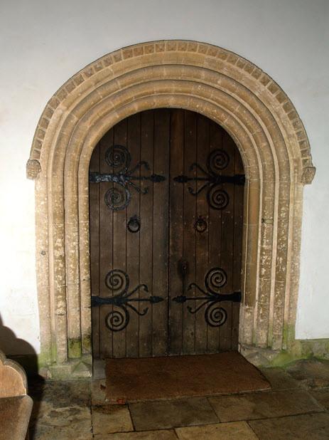The south porch is 13th century and you enter the church through a round arch Norman door into a large nave with north and south aisles.