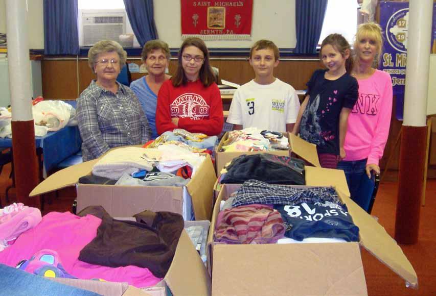 17 The church school children of St. Michael s Orthodox church in Jermyn recently sorted and packed boxes of children s clothing and shoes.