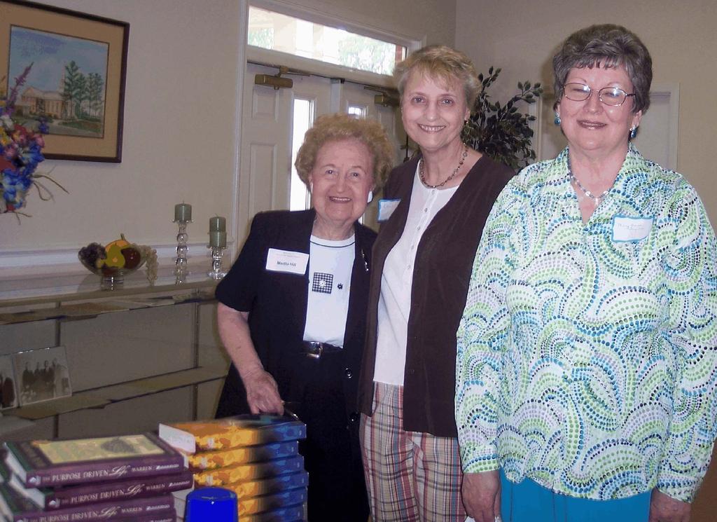 Pictured above is Martha Hill (left) greeting Cheryl Wilder and Mary Anna Ingram at our Open House on April 19.