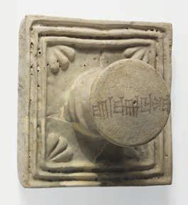 Fig. 8 Elamite glazed-clay knobbed tile and nail with a king s name: I, Untash-Napirisha Fig. 9 Sumerian clay nail with a dedicatory inscription 5.