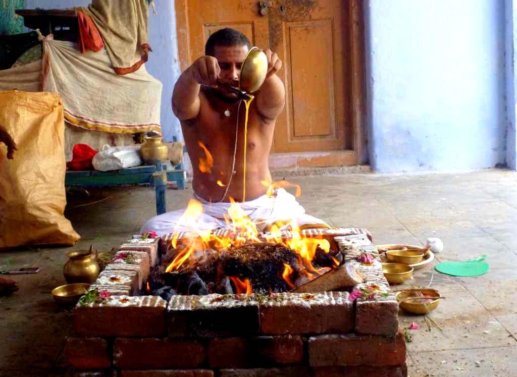 The final offering of ghee is made