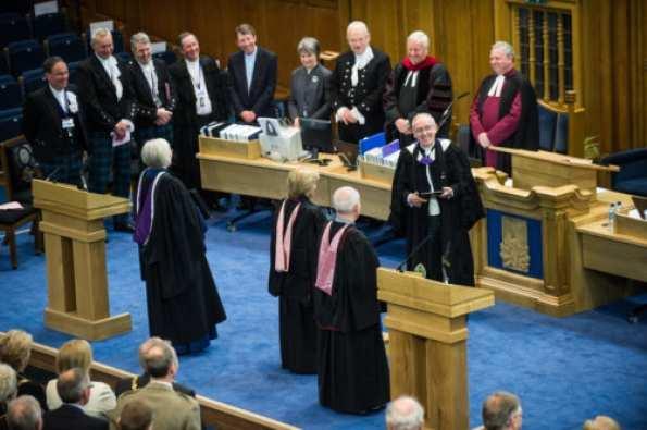 A bow and another bow formed the morning exercises during the General assembly of the Church of Scotland in Edinburgh. When the Moderator comes in, all about 700 commissioners rise from their chairs.