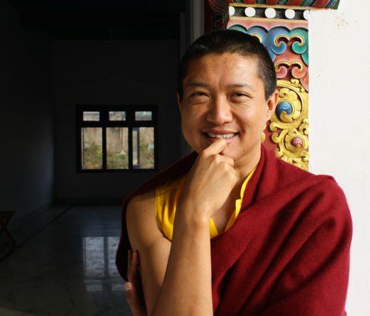 Dungse Lhuntrul Dechen Gyurme Rinpoche (left) Every morning, while his Eminence did his preparatory practices out of view behind a curtain near the empowerment shrine, Lhunpo Rinpoche sat on a small