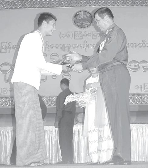 Prizes presented to winners in 16 th Myanmar Traditional (from page 1) Maj-Gen Khin Maung Myint, Minister for Information Brig-Gen Kyaw Hsan, Minister for Industry-2 Vice-Admiral Soe Thein, Minister