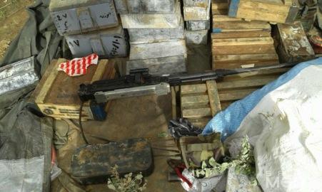 Above: Weapons and arms seized by