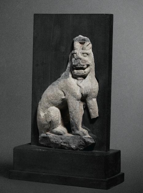 A Xiangtangshan Limestone Sculpture of a Seated Lion Northern Qi
