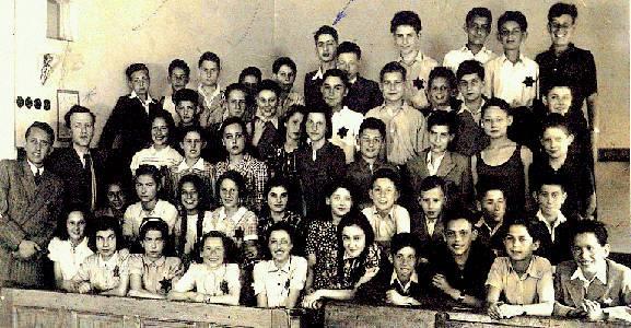 Frank Bright (formerly František Brichta) from England sent us a photograph of his class in the Jewish school in Jáchymova Street, Prague.