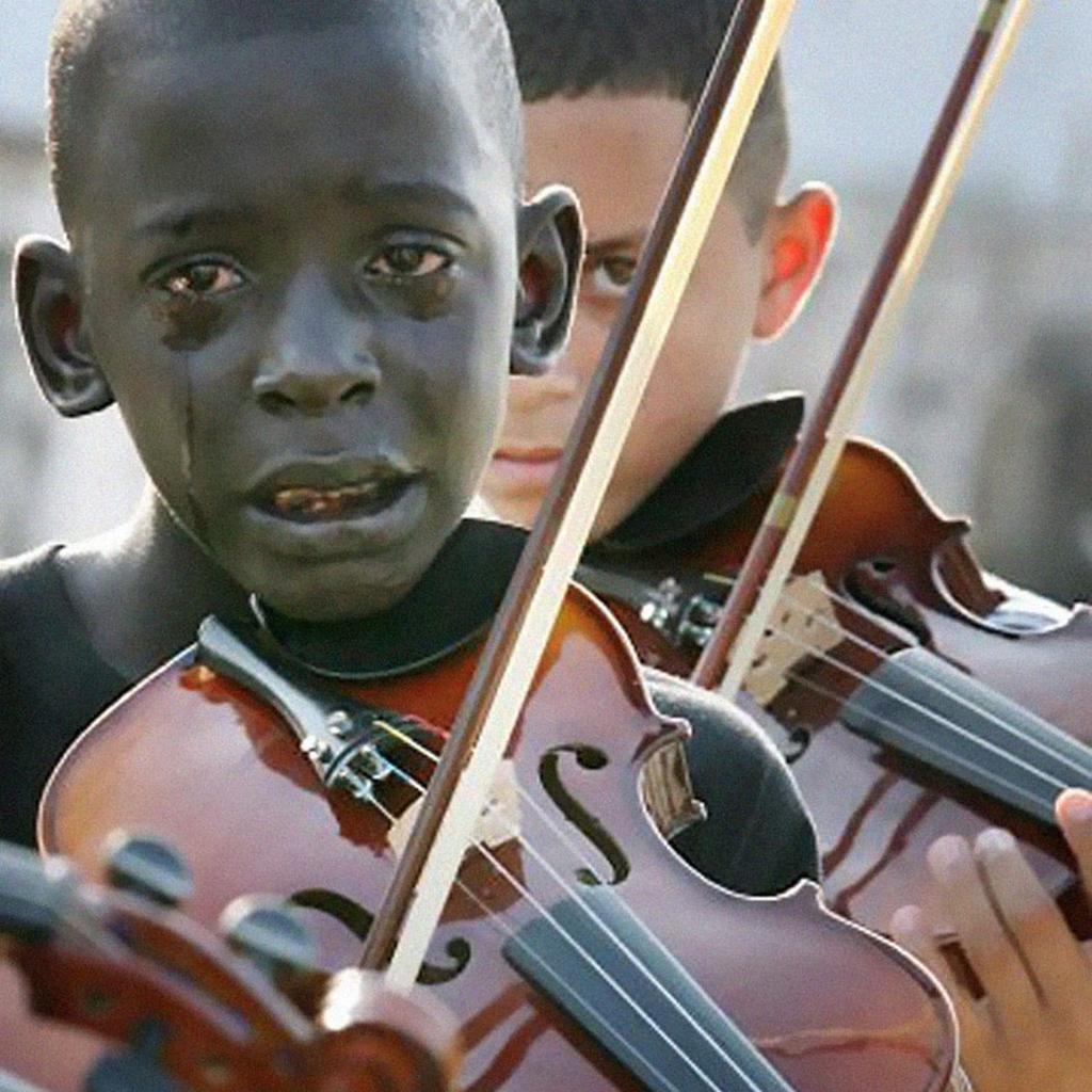 This is Diego crying and playing at the funeral of his mentor and teacher, Evandro João da Silva, who was killed in an assault in October 2009 in Rio De Janerio.