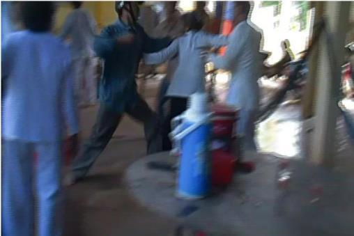 Members of the 1997 Sect attacking Cao Dai followers in their temple, Phu My District, Binh Dinh Province (photo taken on September 16, 2012) Long Binh Cao Dai Temple: On July 3, 2013, about 20 Cao
