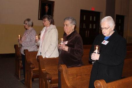 The candles are a reminder of our baptismal vows and the flame symbolizes hope for eternal life. This ministry began primarily as a Ladies of Charity service. Previously, St.