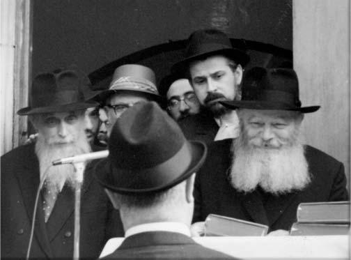 The Rebbe distributing Tanyas with English translation 5735 move and turn, and even hidden evil (the feeling of ego that is hidden within the deep crevices of the animal soul).