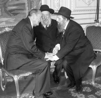 Rabbi Yosef Yitzchok Pevsner, Rabbi Hillel Pevsner, and President Jacques Chirac in friendly conversation admitted to the transformation of the anthem into something holy, similar to Eisav s