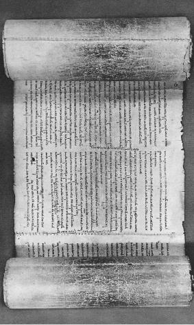 This shows a book in traditional scroll form, as used still in synagogues, and the