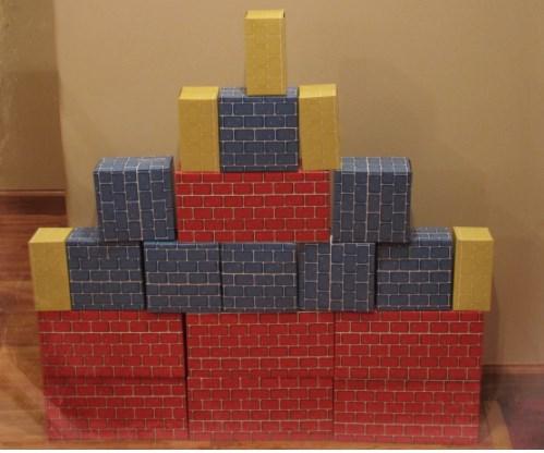 MISSION 5-4 s Mission 5: Superhero Training Red cardboard bricks and Superhero Balls Arrange the cardboard bricks into a building shape and let the children knock down the city walls with their