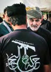 The insignia of the Nujaba Movement, seen on the operative s back, is similar to that of Hezbollah.