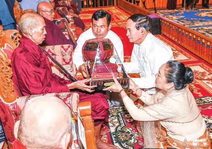 PHOTO: MNA Union Government holds Kathina ceremony FROM PAGE-1 Before the start of the event, State Counsellor Daw Aung San Suu Kyi offered soon (a day meal) in an emerald bowl, flowers and water to