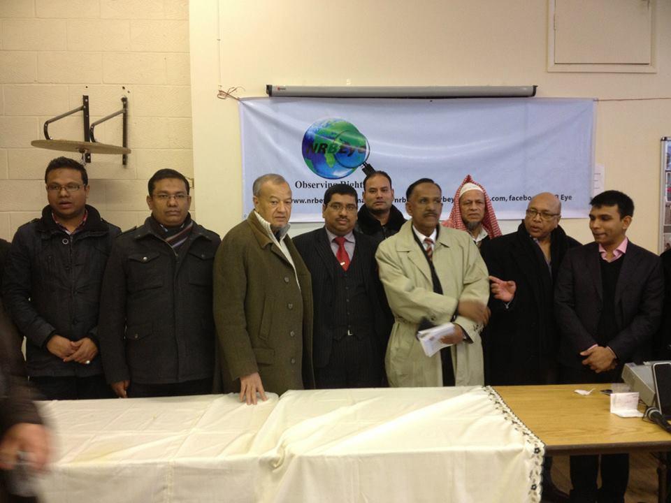 Barrister Nazir Ahmed (fourth from the left with red tie) at a seminar in