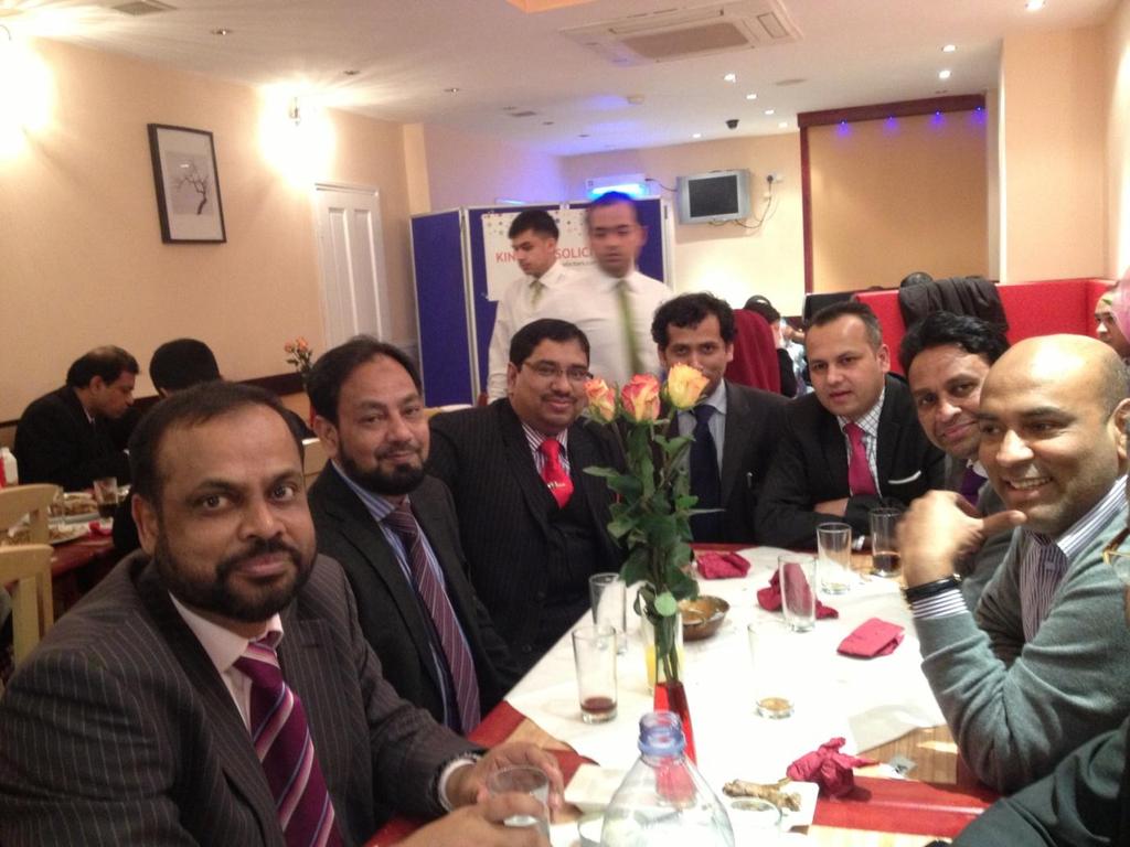Barrister Nazir Ahmed (third from the left with red tie)