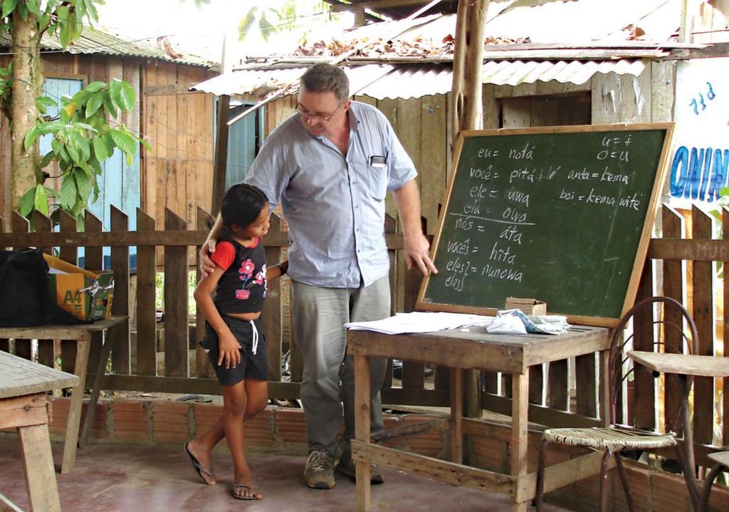 A look back at the Brazil mission Today, Fr. Ron MacDonell works in language revitalization. Above, Fr. Ron coaches an Apurina child at a language workshop in Manaus.