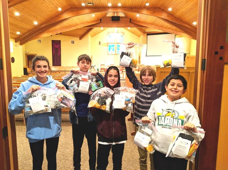 F A I T H M E A L S B Y M A Y 1 3 T H Our Confirmation Class youth quickly sold all of the 148 Faith Meals for the homeless they made as their