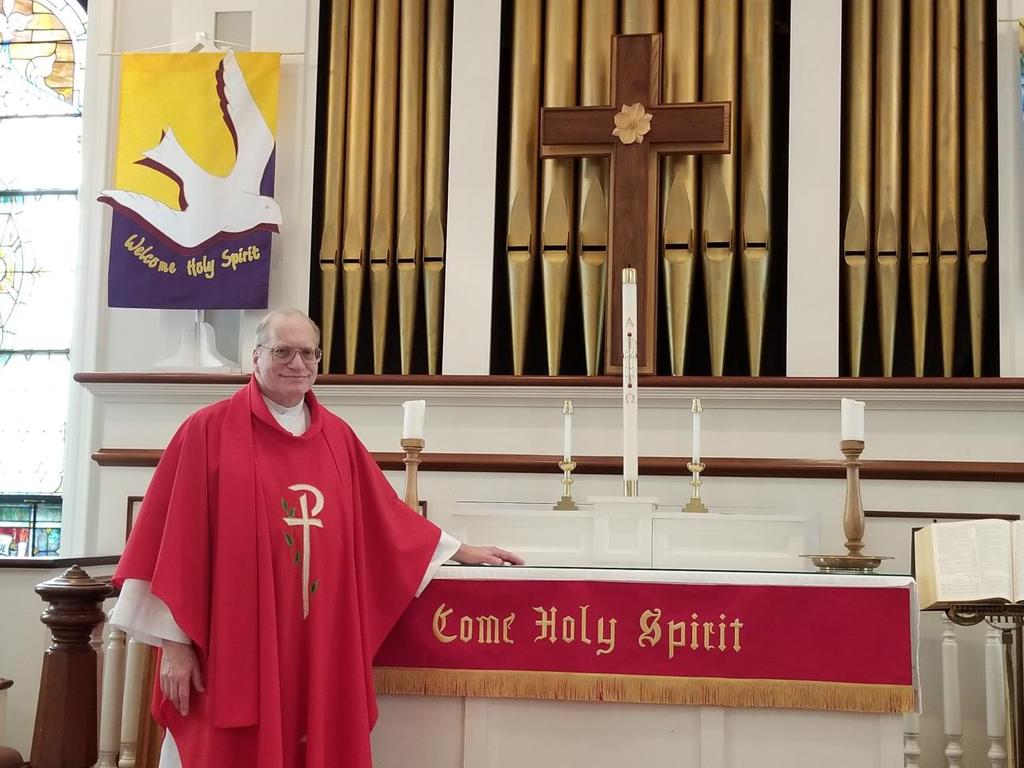 PHOTO CAPTION (2 of 2): A bittersweet farewell: Robed in red to symbolize the fire of the Holy Spirit on Pentecost Sunday in early June, The Rev.