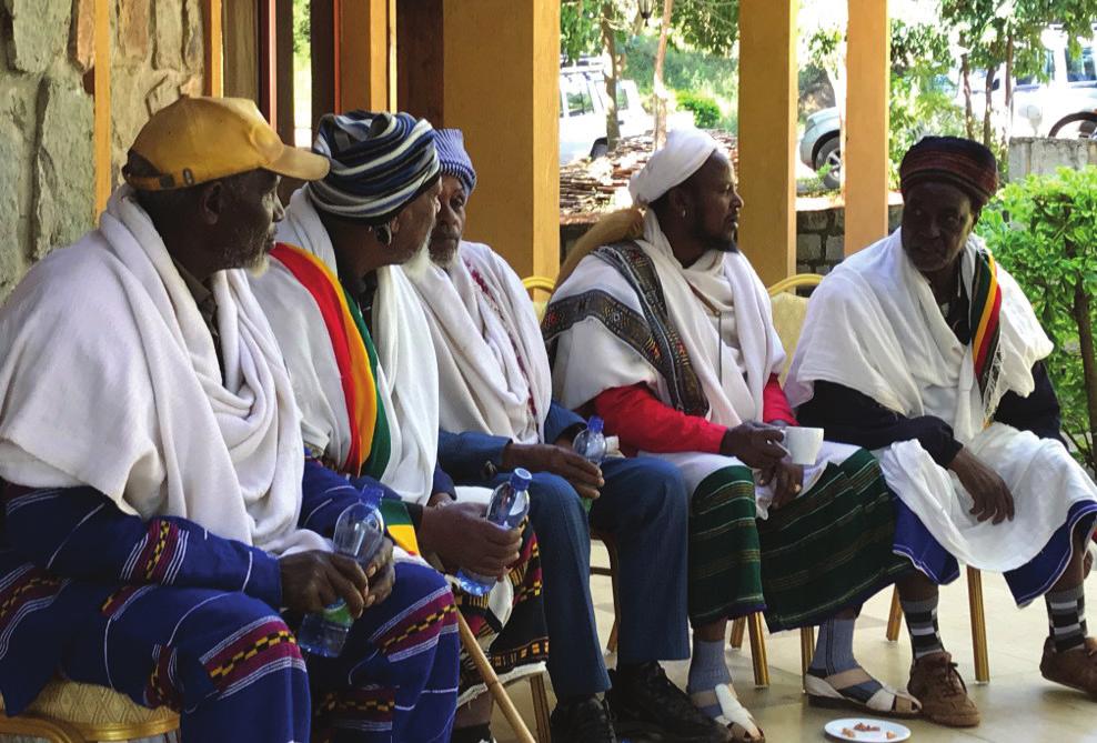 Aba Gedas in discussion, including Wako Wachu (second from left) and Tuke Wako (far right). Photo by Terhas Clark/CRS We have a great reconciliation culture called Gondoro.