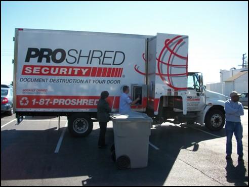 bright sunny, although a bit windy, day. People began lining up to drop off their material for shredding at 11:00AM.