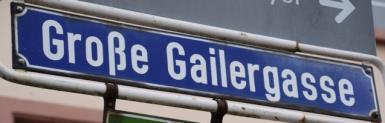 Make a right into Große Gailergasse. Question for Detectives A9 What letter can be found on the unicorn s head?