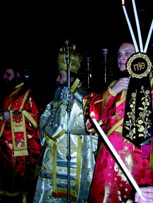 Left: His Beatitude Theophilus, Patriarch of Jerusalem, serving during Holy Week, 2006.