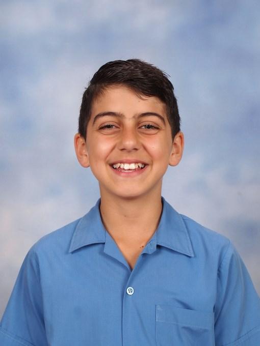 Page 5 Year 6 Snapshot Name: Joshua Sassine Favourite memory of school My favourite memory of school was the colour days we had in kindergarten with Mrs Roberts.