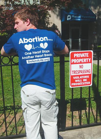 Often, the pro-lifers come in crowds, their numbers swelled by Christendom College students and other collegians who kneel and pray the rosary on the grass plots on either side of the sidewalk