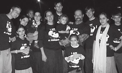 4 DEFEND LIFE May - June, 2010 The Riley clan don their Personhood shirts for a family photo (from left): son-in-law Tyler Upchurch; Sarah, 11; Emily Riley Upchurch; adopted son Josiah, 2; Ellen, 18;