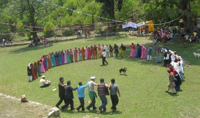 People enjoying dushka, the traditional dance, during the forest fair (photo K Ramnarayan) On reaching the meadow one can immerse oneself in the festivities of the food and craft stalls, the photo