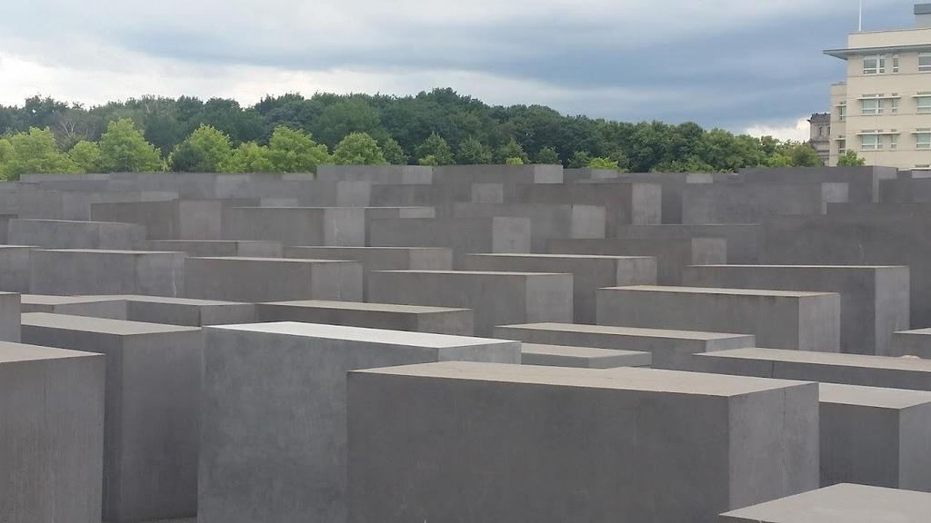 DAVID LERNER The group tours the 2005 Memorial to the Murdered Jews of Europe, a 5 acre field at the center of Berlin of some 2,700 concrete blocks, or stellae, set slightly askew in a grid pattern.