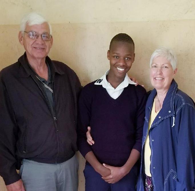 Four volunteers extended their stay for five weeks (three volunteers taught Sponsors visiting their student, Johnson, while in Tanzania. at Uroki High School and Dr.